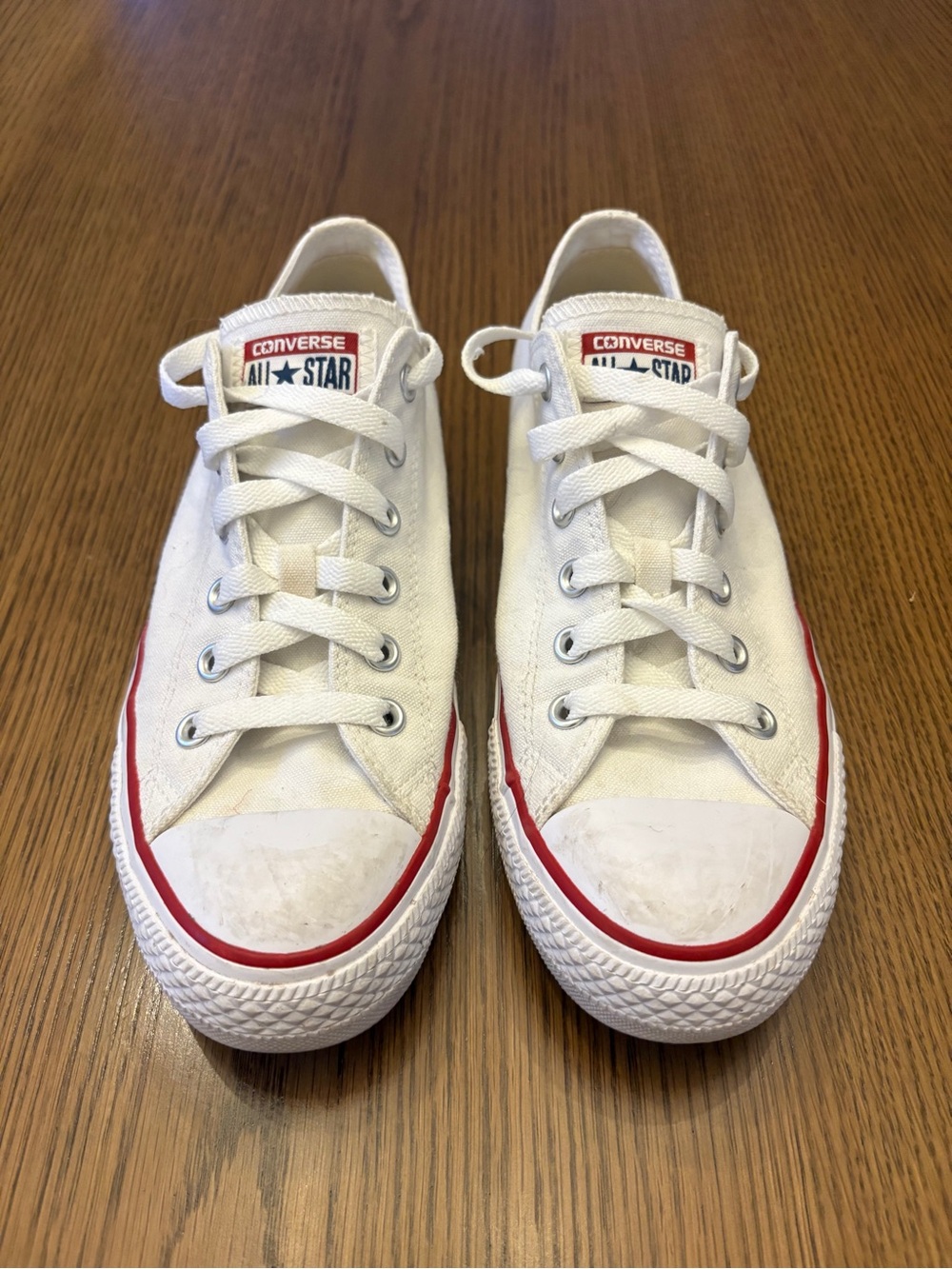 Converse White Low Top Sneakers with Red Accent